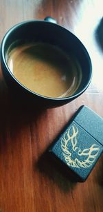 Close-up of coffee cup on table