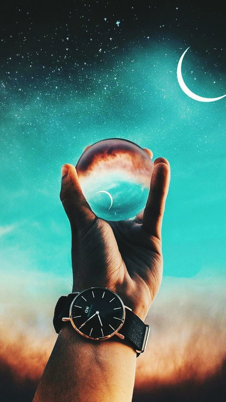 human hand, hand, one person, real people, human body part, sky, body part, holding, human finger, personal perspective, lifestyles, finger, star - space, unrecognizable person, leisure activity, nature, cloud - sky, space, night, outdoors, astronomy, digital composite