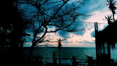 Scenic view of sea against cloudy sky