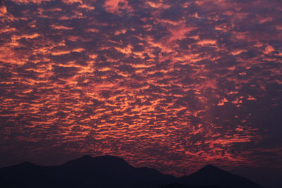 Scenic view of dramatic sky during sunset