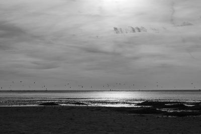 View of calm beach against the sky