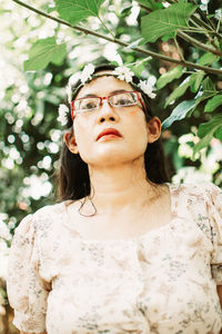 Portrait of young woman looking away