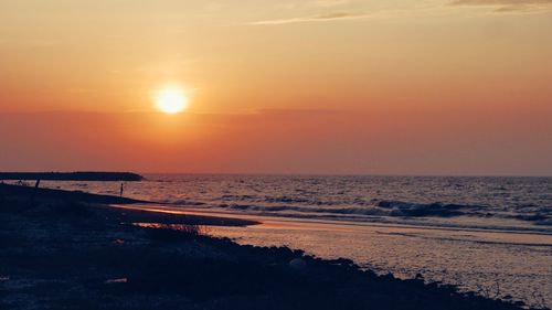 Scenic view of sunset over sea