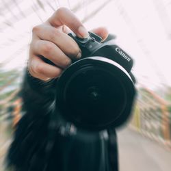 Midsection of person photographing