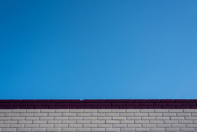 Low angle view of building against blue sky