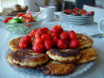 Close-up of strawberries in plate on table