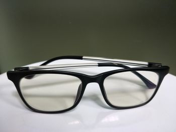 Close-up of sunglasses on table