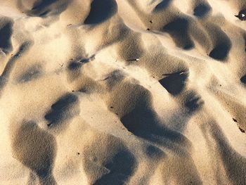 High angle view of shadow on sand