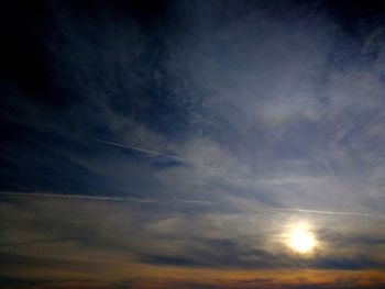 Low angle view of dramatic sky during sunset