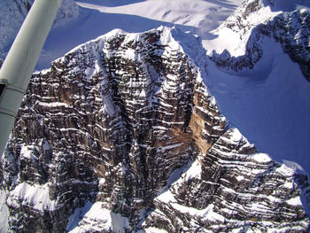 Scenic view of snow covered mountains