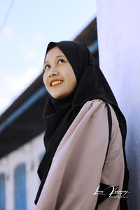 Portrait of a smiling young woman