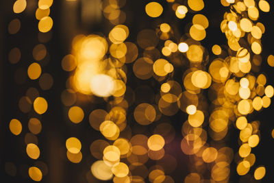 Defocused image of illuminated christmas lights