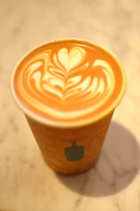 Close-up of cappuccino on table