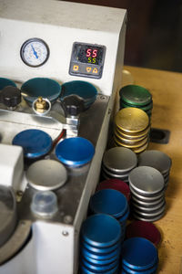 High angle view of various buttons on table