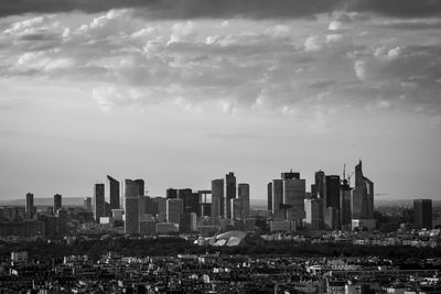 View of buildings in city against sky