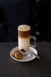 Close-up of cappuccino on table