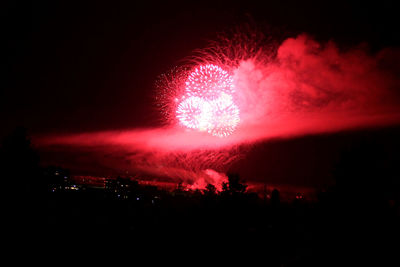Firework display at night