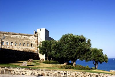 View of fort against blue sky