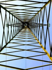 Low angle view of footbridge against clear sky