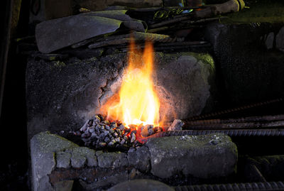 Bonfire on rocks against fire
