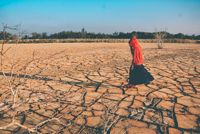 Woman walking on land