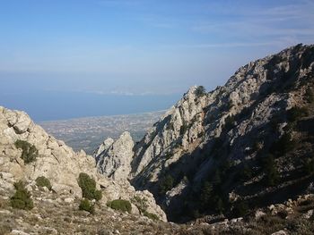 Panoramic view of rocks and mountains against sky