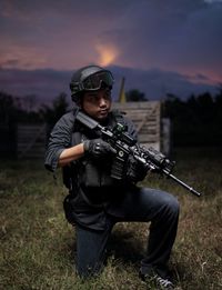 Special forces with weapons and equipment at night