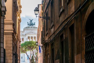 Low angle view of old buildings in city