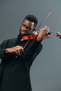 Young woman playing violin