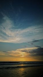 Scenic view of sea against sky at sunset