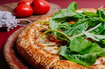 Close-up of pizza served on table