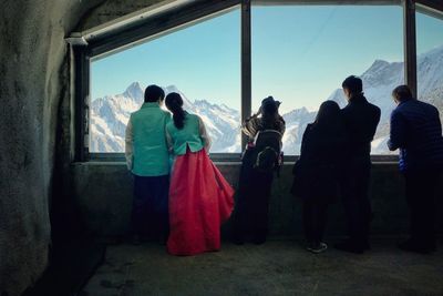 Group of people standing on walkway