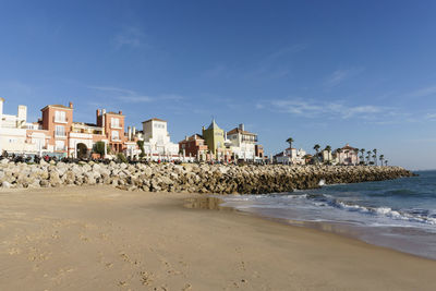 View of cityscape at beach