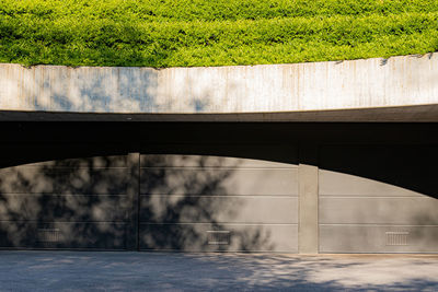 Blurred motion of bridge on road