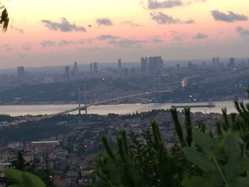 Aerial view of city at dusk