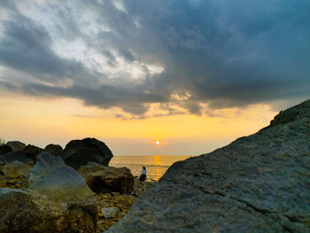 Scenic view of sea against sky during sunset