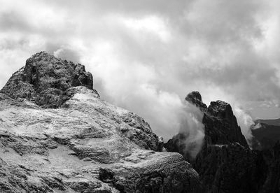 First snow on dolomites, walking on altopiano della rosetta