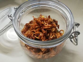 High angle view of noodles in jar on table