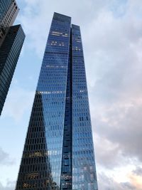 Low angle view of skyscrapers against sky