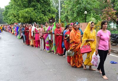 Group of people standing on street