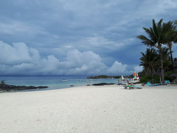 Scenic view of beach against sky