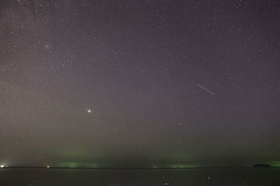 Scenic view of star field against sky at night