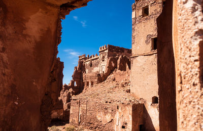 Low angle view of old building against sky