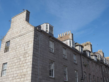 Low angle view of old building against sky