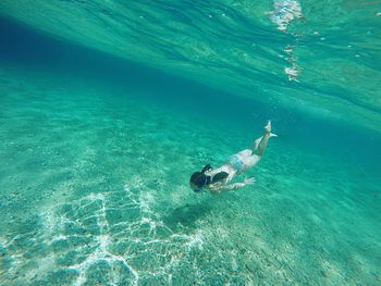 Man swimming in sea