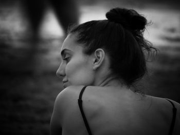 Close-up portrait of a girl looking away