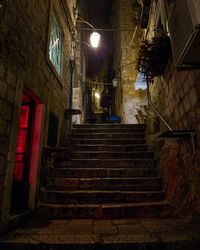 Low angle view of stairs at night