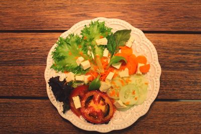 Directly above shot of flowers in plate on table
