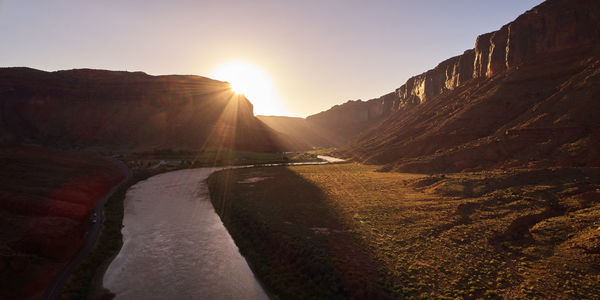 Scenic view of mountains against sky during sunset