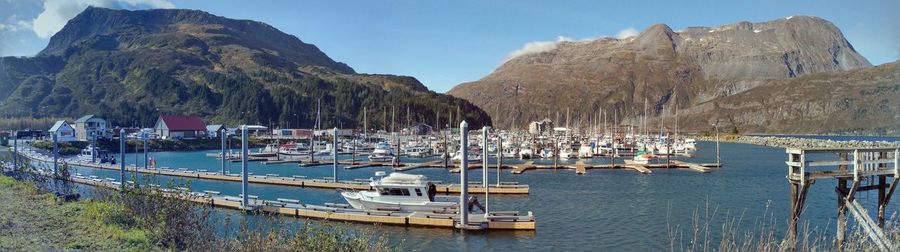 Yachts moored on sea